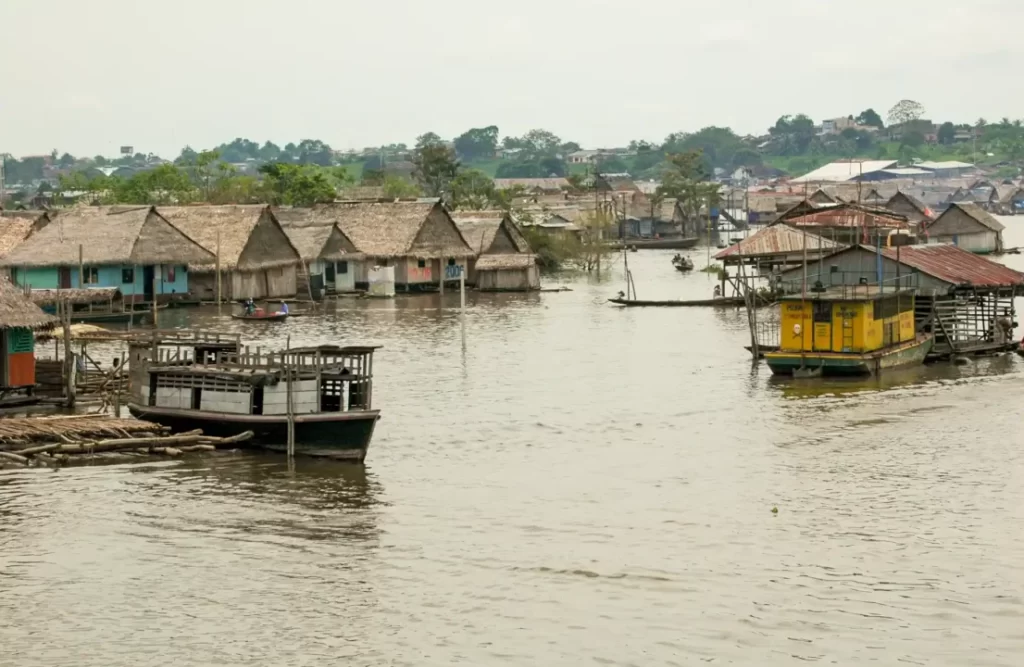 Boats roam around the Belén port in Iquitos